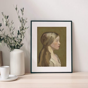 May include: A framed painting of a woman with long brown hair, wearing a white dress, against a muted green background.