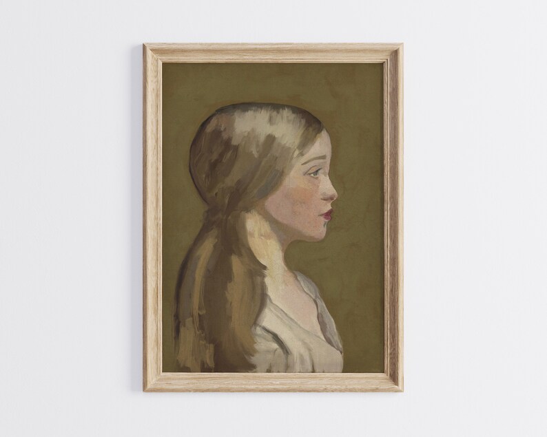 May include: A framed painting of a woman with long, flowing blonde hair. She is wearing a white shirt and is looking to the right. The background is a muted green.