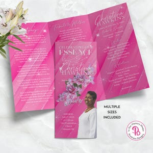 May include: A pink trifold memorial program with the name "Christina Hawkins" and dates. The program includes a photo, floral accents, and text about the service. The words "Celebrating Her Essence" are prominently displayed.