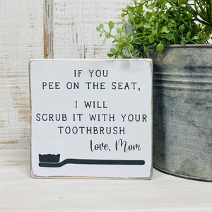 If you pee on the seat I will scrub it with your toothbrush sign - Funny boys bathroom sign - funny kids boys bathroom sayings quotes puns