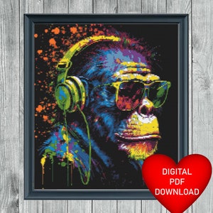 May include: A colorful digital painting of a monkey wearing headphones and sunglasses. The monkey is surrounded by splashes of paint in various colors, including red, yellow, green, blue, and purple.