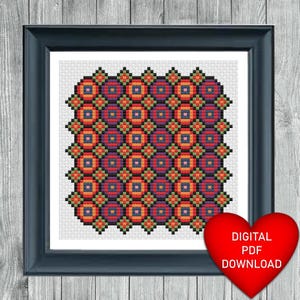 May include: Cross stitch pattern featuring a geometric design with circles in shades of red, orange, purple, and green. The pattern is framed in a black frame. The text "DIGITAL PDF DOWNLOAD" is on a red heart.