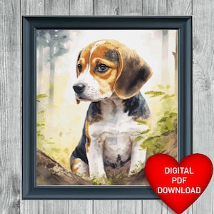 May include: A digital download of a cross stitch pattern featuring a beagle puppy sitting in a forest setting. The puppy is brown, white, and black with a soft, fluffy coat. The background is a blurred image of trees and foliage.