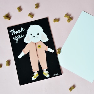 Carte Postale bichon blanc. Illustration chien blanc en combinaison - thank you fond noir- 10.5 cm x 14.8 cm.