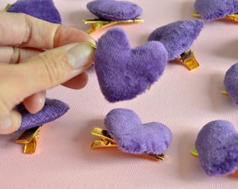 Pair of purple heart shape hair clip - purple velvet on golden metal base.