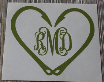 May include: A green vinyl decal of two fishing hooks forming a heart shape with the monogram "RMD" inside.