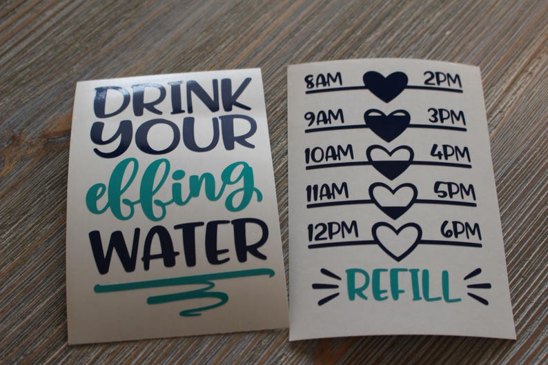 May include: Two stickers, one with the text "DRINK YOUR EFFING WATER" in black and teal lettering, and the other with a water tracker with times from 8 AM to 6 PM and the word "REFILL" in teal lettering.