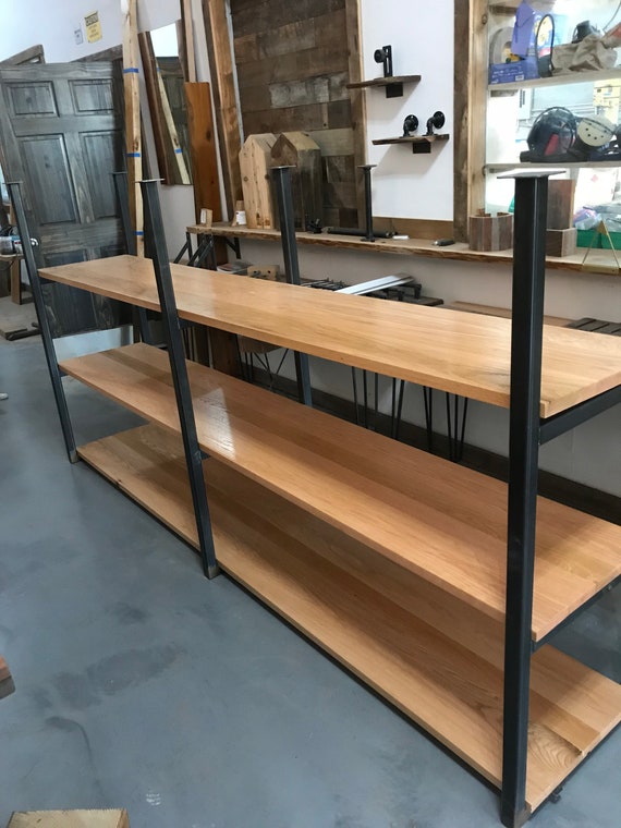 Ceiling Mounted Shelving System Made From Solid Tube Steel And Oak Wood