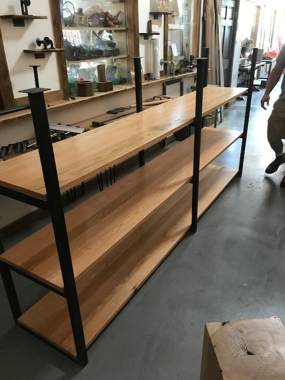 Ceiling Mounted Shelving System Made From Solid Tube Steel And Oak Wood