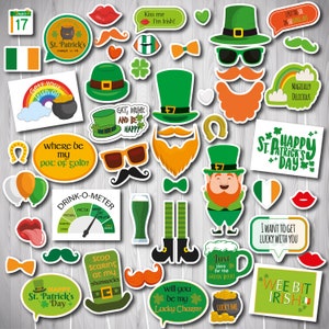 Puede incluir: Un conjunto de 20 accesorios de cabina de fotos imprimibles para el Día de San Patricio. Los accesorios presentan una variedad de diseños verdes, naranjas y blancos, incluyendo tréboles, duendes y jarras de cerveza. Los accesorios son perfectos para agregar un toque festivo a tu fiesta del Día de San Patricio.