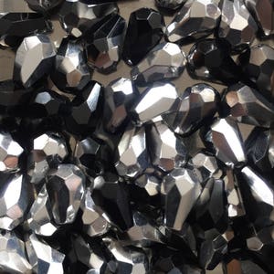 50 St. Glass cut drops opaque black silver, 6 x 9 mm