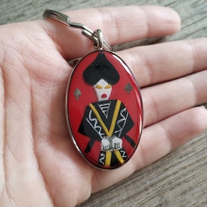 Handgemaakte schoppenvrouw sleutelhanger