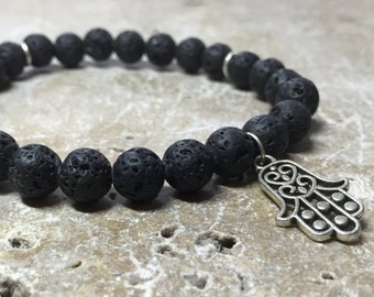 Schwarzes Lavaperlen-Mala Armband mit Hamsa Anhänger