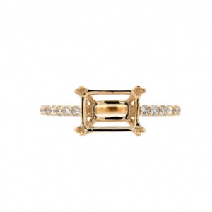 May include: A gold ring setting with a rectangular center stone setting and a band of small round diamonds.