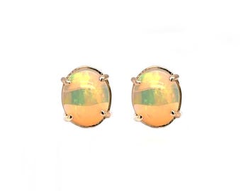 Ethiopian Opal Oval 3.29 Carat Solitaire Stud Earring in 14K Yellow Gold (145816)