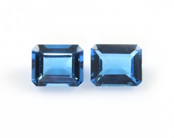 エメラルドカット青色宝石ピアス スイスブルートパーズ エメラルドカット 11 x 9 mm 約10カラット 12月