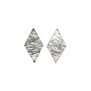 May include: A pair of clear quartz earrings with black inclusions in a diamond shape.