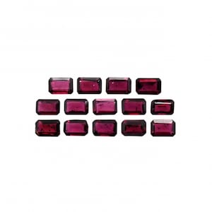 May include: A collection of 15 deep red rectangular gemstones, likely rubies, arranged in a staggered pattern.