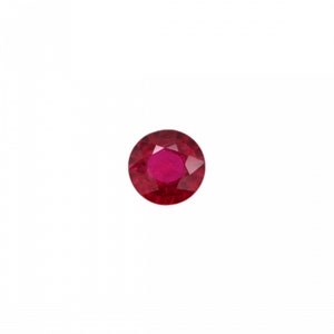 May include: A round, faceted ruby gemstone. The gem is a deep red color with a lighter, brighter red center. The gemstone is set against a plain white background.