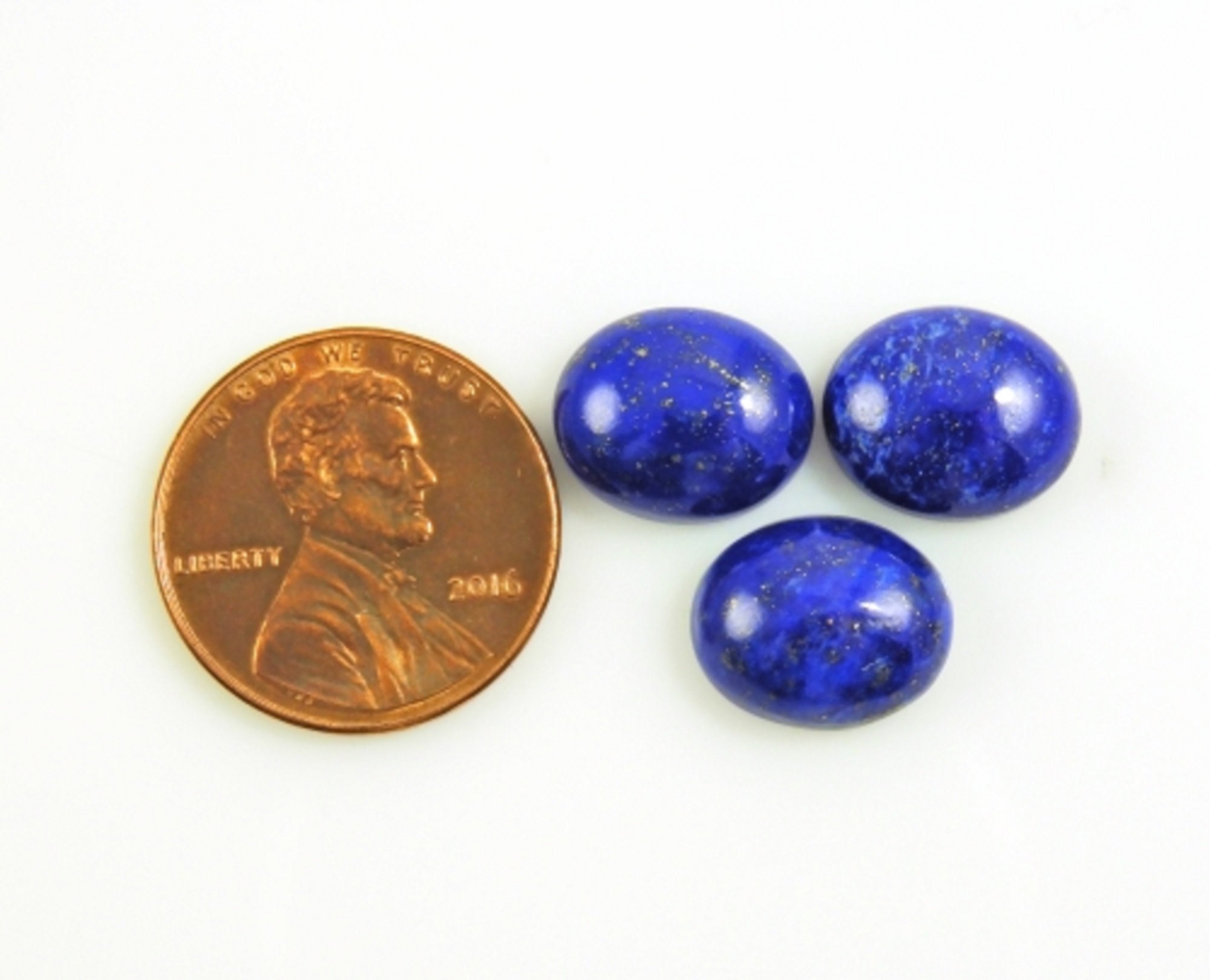 ラピスラズリ キャブ 楕円形 12 x 10 mm 約 14 カラット、1 月の誕生石