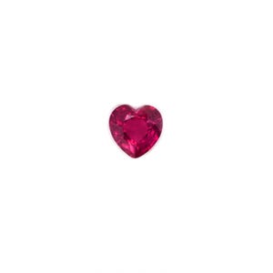 May include: A heart-shaped, faceted gemstone in a vibrant shade of red. The gemstone is set against a plain white background, highlighting its shape and color. The gem's facets catch the light, creating a sparkling effect.