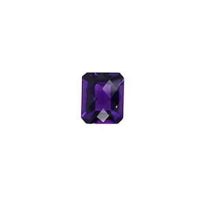 May include: A rectangular-cut, faceted amethyst gemstone. The gem is a deep, rich purple color with a brilliant, reflective surface. The cut showcases the gem's clarity and internal structure, ideal for jewelry.