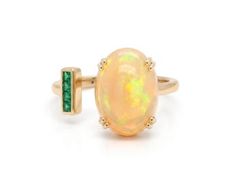 Ethiopian Opal Cab Oval Shape 4.57 Carat Ring In 14K Yellow Gold with Emeralds (145833)