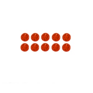 May include: Ten small, round, orange-red gemstones. The gemstones are arranged in two rows of five.