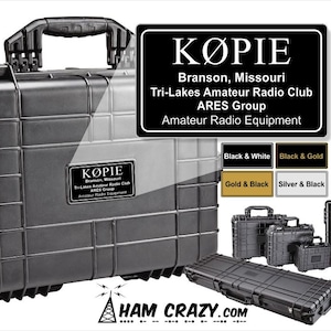 May include: A black hard-shell protective equipment case with a top handle and a rectangular label reading KØPIE, Branson, Missouri, Tri-Lakes Amateur Radio Club, ARES Group, Amateur Radio Equipment. Includes color options: Black & White, Black & Gold, Gold & Black, Silver & Black.