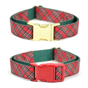 May include: Two pet collars featuring a red, green, and white plaid fabric pattern layered over a solid dark green nylon webbing strap. One collar has a shiny gold-toned metal side-release buckle, while the other has a solid red plastic buckle.
