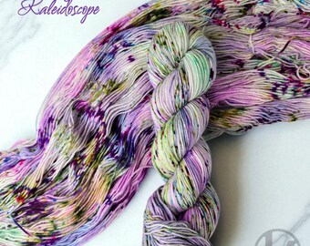Twisting the Kaleidoscope- Hand Dyed speckled Variegated Yarn - fingering worsted dk or bulky yarn- pastel purple Violet lilac lavender spec