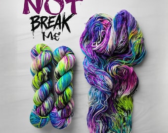 You will not break me - Hand-Dyed Variegated Yarn: dungeon Crawler Carl inspired DCC collection - purple blue green black white speckled