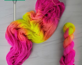 Sunrise Blvd - Hand Dyed Variegated Yarn - lace fingering worsted dk or bulky yarn- florescent fuchsia yellow neon glows in blacklight