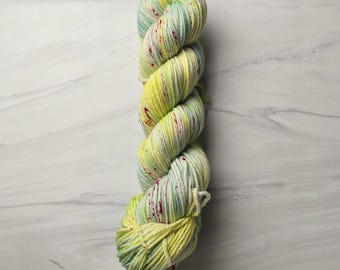 RTS Ready to Ship - W86 Worsted yarn base -exact skein shown - 100g 219 yards ultra fine SW Merino-  lime green with red speckles