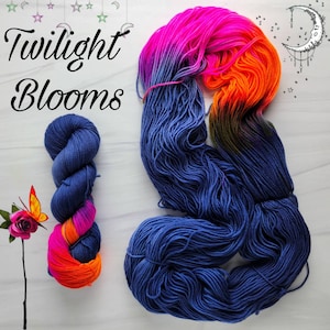 Twilight Blooms-  Hand dyed assigned pooling variegated yarn - perfect for socks -dark navy blue with a pop of florescent pink and orange