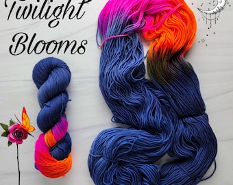 Twilight Blooms-  Hand dyed assigned pooling variegated yarn - perfect for socks -dark navy blue with a pop of florescent pink and orange