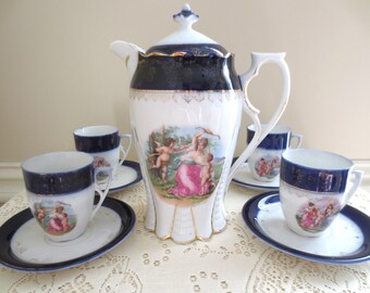 Antique Teapot with Teacups and Saucers, made in Germany. Porcelain Tea Set with Cherubs, Tea Party Supplies, Alice in Wonderland Decor