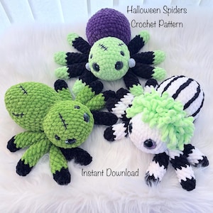 May include: Three crocheted spider toys with plush textures. One is green with black legs, one has a purple body and light green head, and one is white with black stripes and green hair. Text reads: Halloween Spiders Crochet Pattern Instant Download.