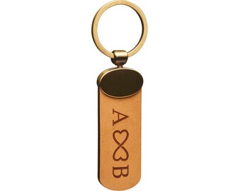 Keychain with metal closure "OVAL" 4 mm leather with its own desired engraving (text, symbol or own graphic)