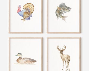 May include: Set of four watercolor animal illustrations in simple frames. The illustrations feature a turkey, a fish, a duck, and a deer.