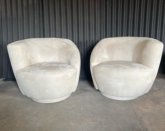 Pair of "Nautilus" Swivel Chairs by Precedent