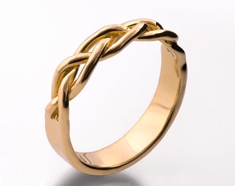 May include: A gold braided ring with a smooth, polished finish.