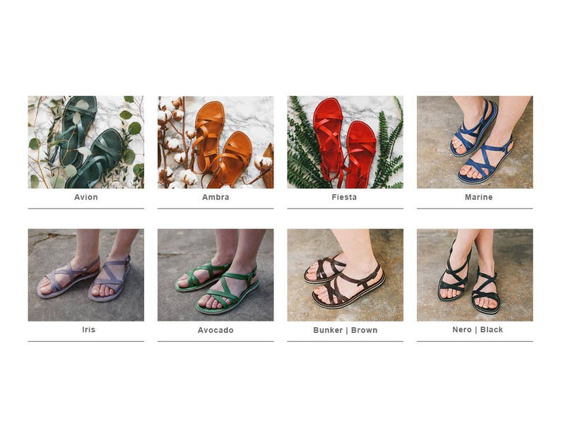 May include: A set of ten pairs of leather sandals in various colors, including blue, green, red, brown, and black. The sandals have a simple design with a single strap across the foot and a buckle closure.
