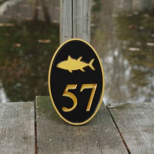 Carved Oval House number with tuna fish or other stock image (HN57)