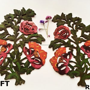 Peut inclure: Deux d&eacute;coupes de papier sym&eacute;triques de motifs floraux avec des feuilles vertes et des fleurs roses et rouges. Les d&eacute;coupes sont &eacute;tiquet&eacute;es "GAUCHE" et "DROITE".