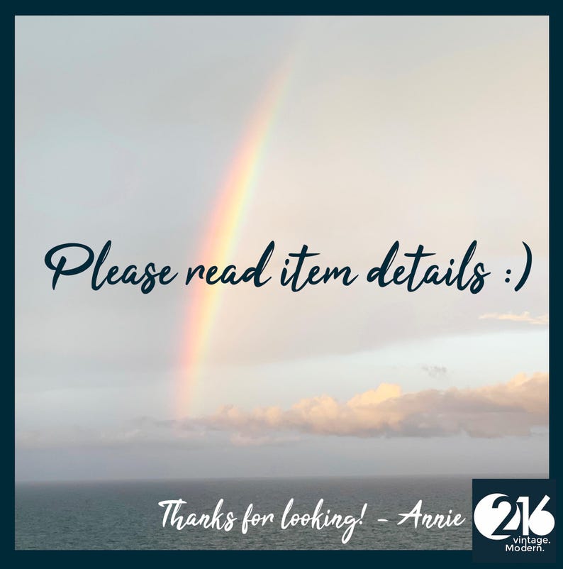 May include: A scenic view of the ocean and sky featuring a vibrant rainbow arching through the clouds. The text "Please read item details :)" is centered, and the text "Thanks for looking! - Annie" appears above a "216 vintage. Modern." logo.