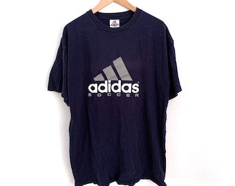 ウェア 80s adidas game shirt vintage navy Vintage 70-80s ADIDAS V Neck T-shirt Navy Blue W Tan Stripes