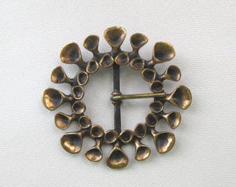 Hebilla de cinturón de bronce de Hannu Ikonen: Joyería modernista finlandesa