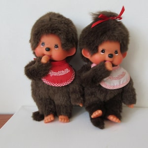 Vintage 1980s Monchhichi Dolls: Sekiguchi Girl and Boy Pair with Bibs