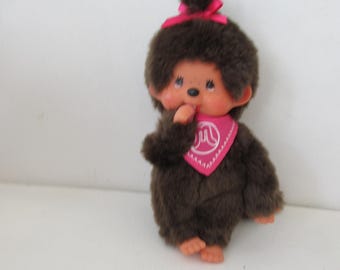 ヴィンテージ モンチッチ人形 - 赤いリボンとよだれかけ付きのセキグチ